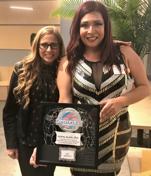 Dr. Ashley Austin presented with the 2017 Trans Ally Award from the TransLatina Coalition-Florida Chapter