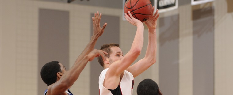 Men's Basketball Earns First Conference Win
